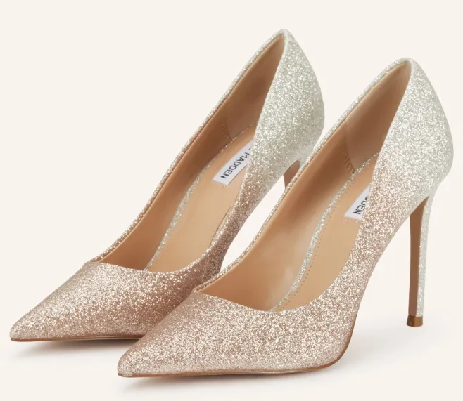 STEVE MADDEN THRIVE High-Heel-Pumps in silbernem Glitzerfinish mit spitzer Kappe und schlankem Absatz.