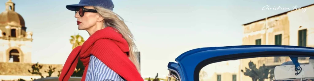 Christian Berg Mode für Damen mit klassischem Freizeit-Look und farbigem Strickpullover.