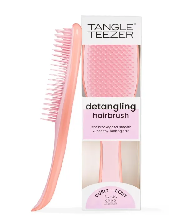 Rosa „Tangle Teezer“ Entwirrungsbürste für lockiges, krauses Haar (3C–4C) neben Verpackung – geeignet zum Lösen verfilzter Haare