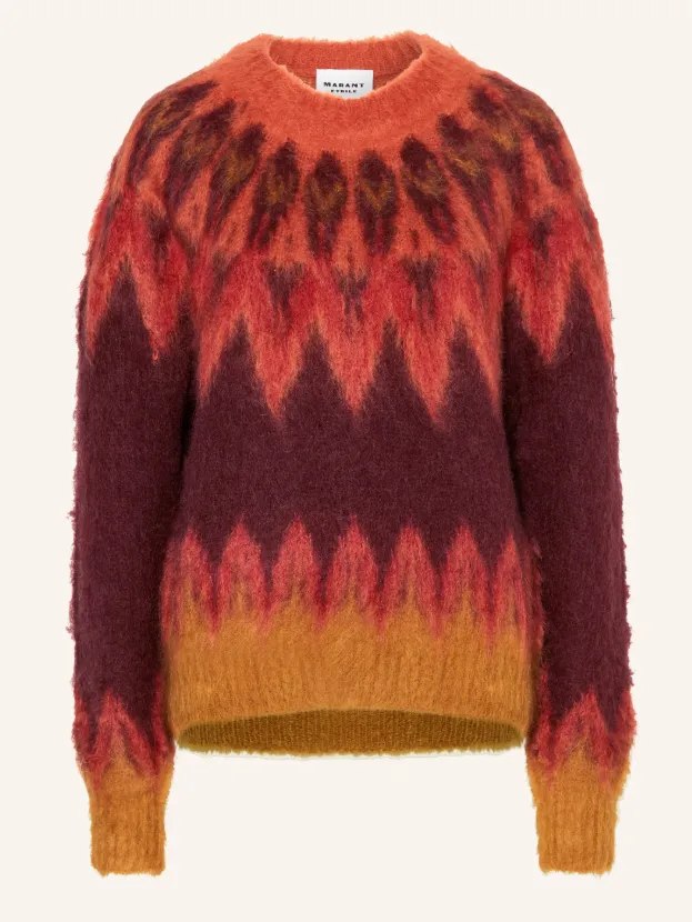 Damen-Weihnachtspullover in warmen Rot-, Bordeaux- und Ockertönen mit flauschiger Textur und grafischem Farbverlauf.